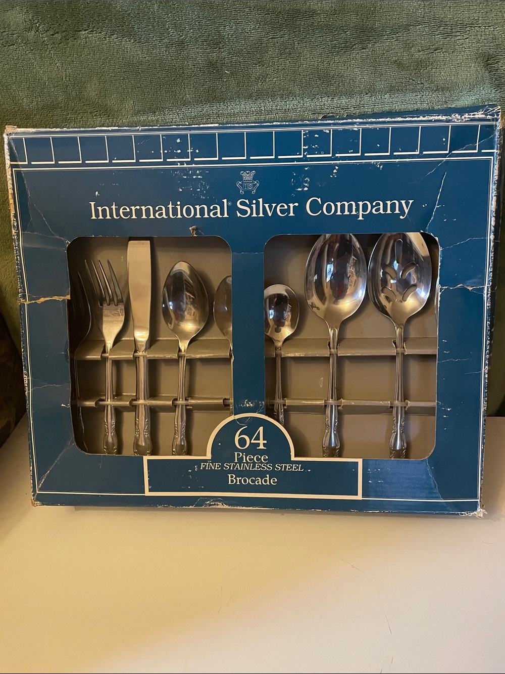 Brocade 64-Piece Stainless Steel Flatware Set in Silver